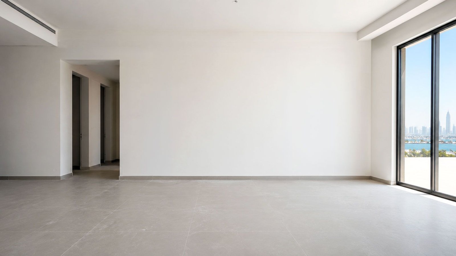 Empty Dubai apartment living room before the UNIQ renovation